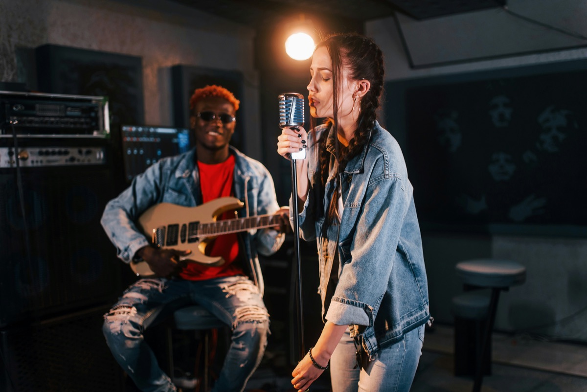 Musicians rehearsing in a studio
